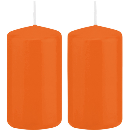 2x Oranje cilinderkaarsen/stompkaarsen 5 x 10 cm 23 branduren