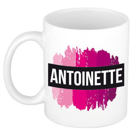 Naam cadeau mok / beker Antoinette  met roze verfstrepen 300 ml