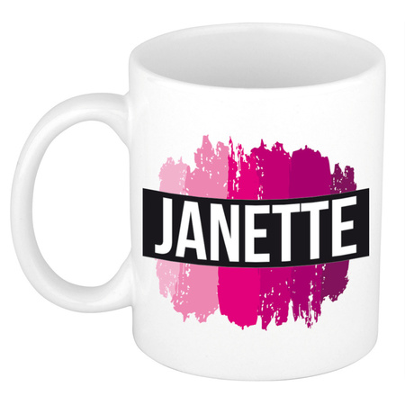 Naam cadeau mok / beker Janette  met roze verfstrepen 300 ml