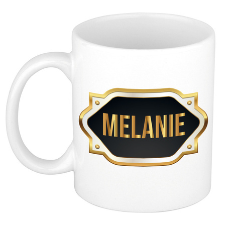 Naam cadeau mok / beker Melanie met gouden embleem 300 ml