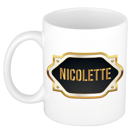 Name mug Nicolette with golden emblem 300 ml